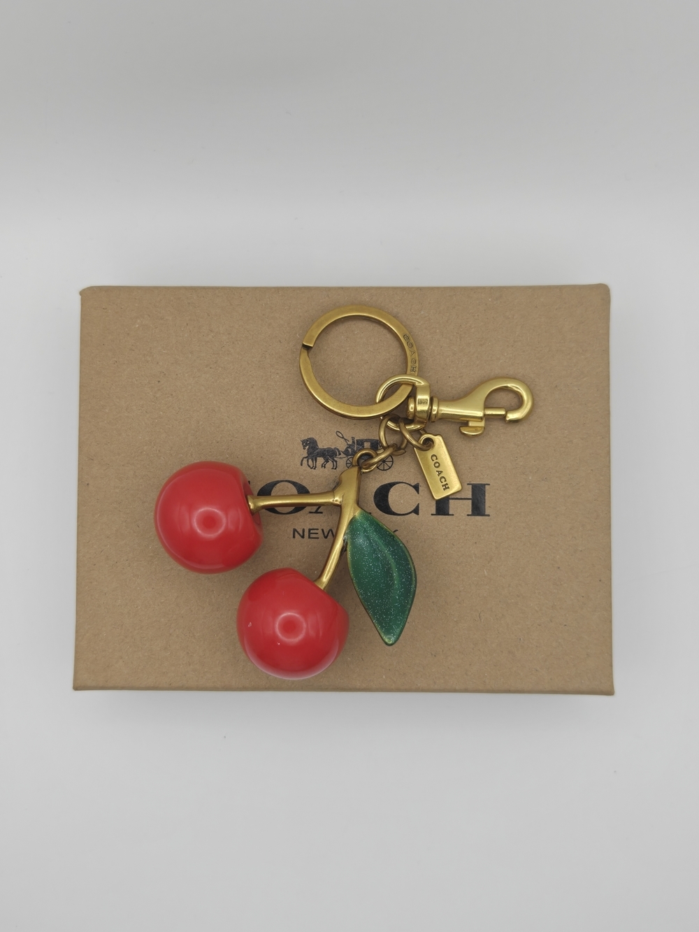 Coach Red Cherry Bag Charm Keychain with Green Leaf and Gold Hardware